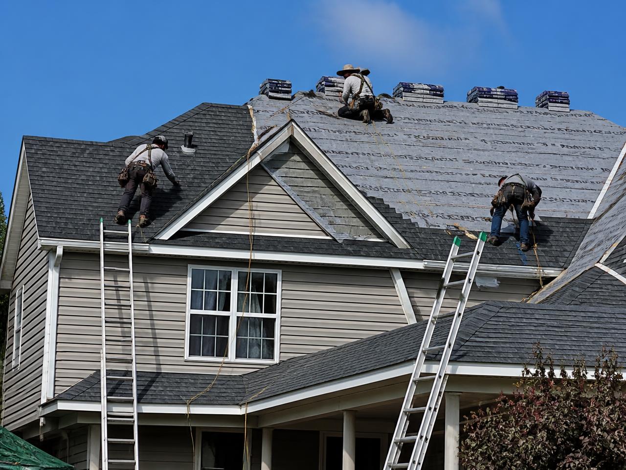 Triumph Roofing crew completing a roof replacement in Charlotte, NC